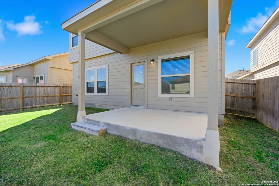 Exterior details and patio area of a home in Abbott Place, St. Hedwig (Image 29).
