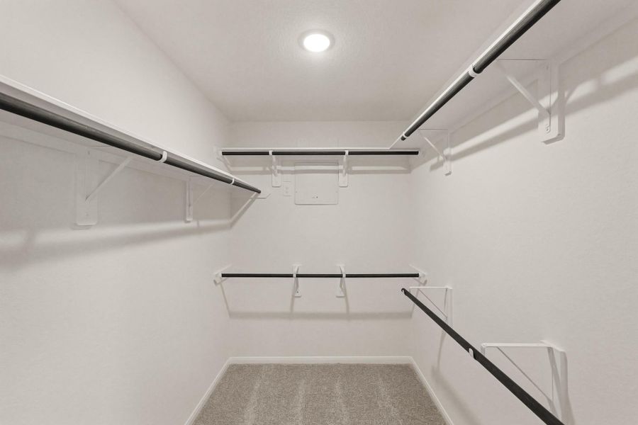 Owner's suite walk-in closet (*Photo not of actual home and used for illustration purposes only.)