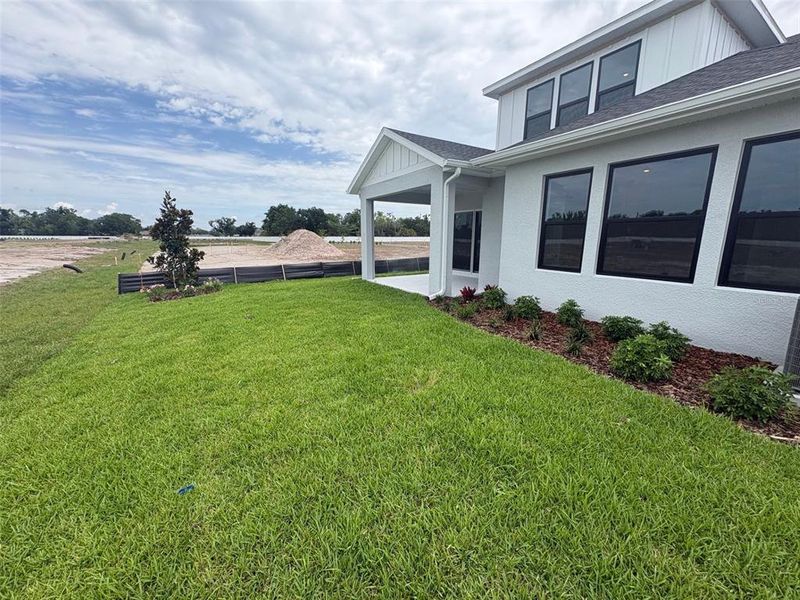 Exterior details and patio area of a home in Lakeview Crossing – Tradition Series, Sarasota (Image 18). Exterior details and patio area of a home in Lakeview Crossing – Tradition Series, Sarasota (Image 18).