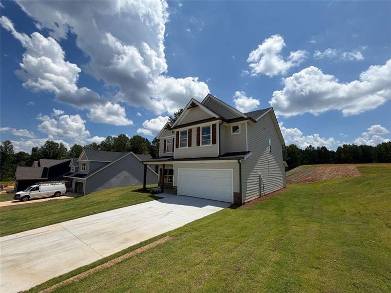 Front exterior of a new home in , Lula, GA, highlighting curb appeal (Image 20). Front exterior of a new home in , Lula, GA, highlighting curb appeal (Image 20).