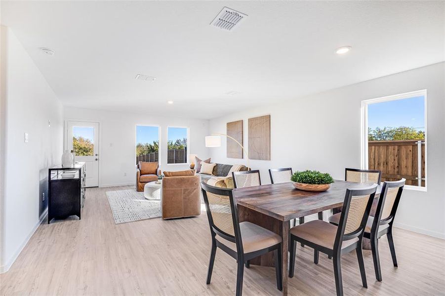 Dining area featuring light hardwood / wood-style flooring