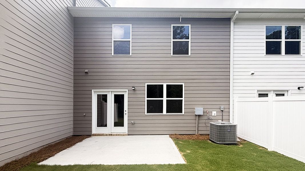 Exterior details and patio area of a home in Independence Villas and Townhomes, Loganville (Image 3). Exterior details and patio area of a home in Independence Villas and Townhomes, Loganville (Image 3).