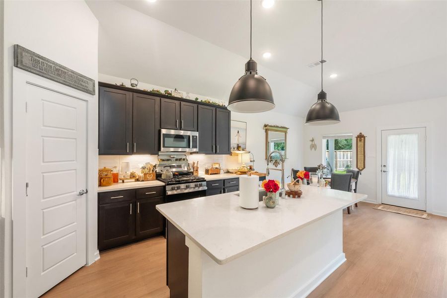 Furnished interior view inside a new home in Pinewood at Grand Texas, New Caney (Image 27).