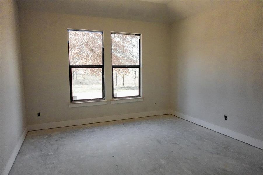 Spare room with concrete flooring