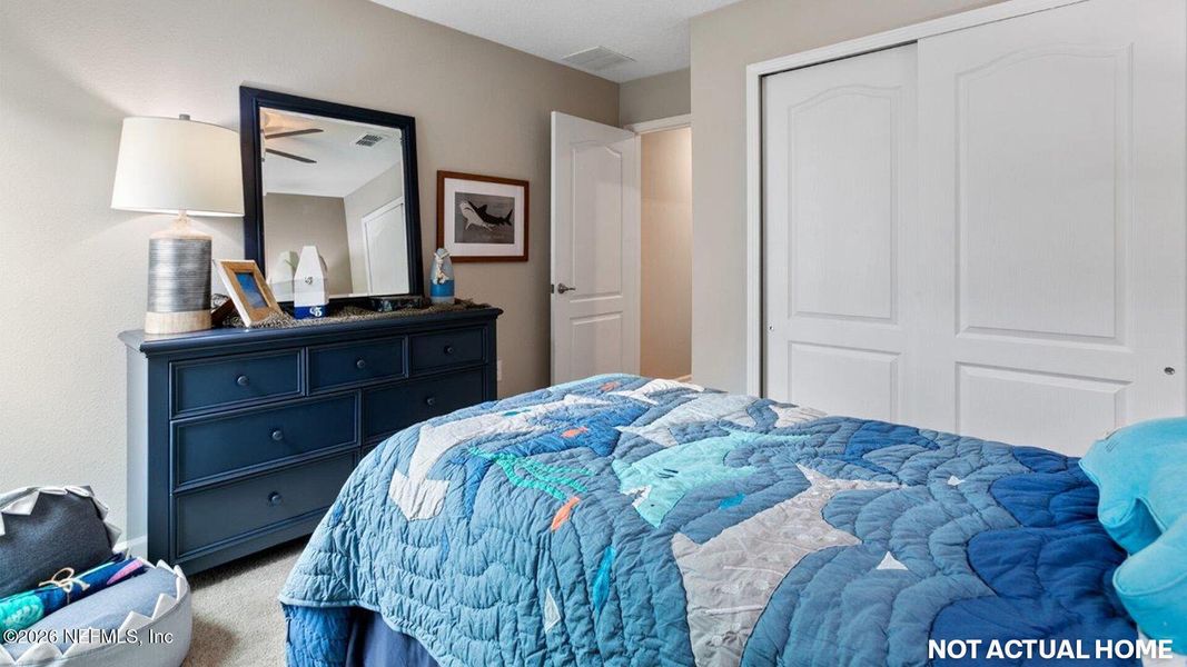 Furnished interior view inside a new home in American Village, Palm Coast (Image 14).