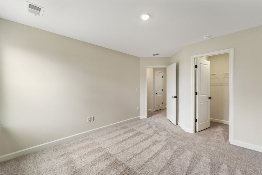 Spacious, unfurnished interior of a new home in Cottages at Lake Emory, Inman (Image 28). Spacious, unfurnished interior of a new home in Cottages at Lake Emory, Inman (Image 28).