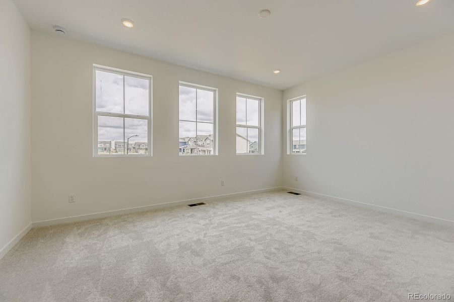 Spacious, unfurnished interior of a new home in Sky Ranch: Parkside Collection, Watkins (Image 10).