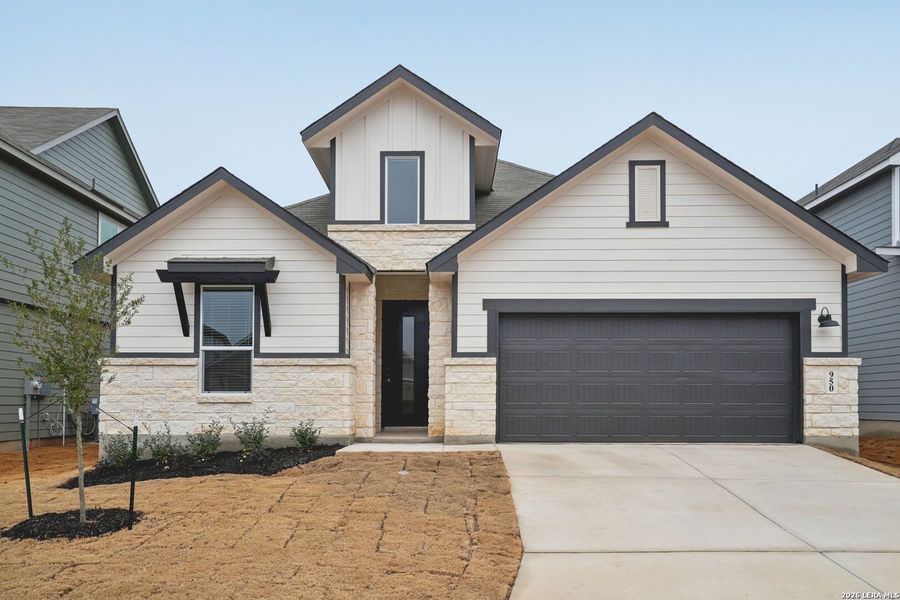Front exterior of a new home in Estancia Ranch - Classic Series, San Antonio, TX, highlighting curb appeal (Image 23).