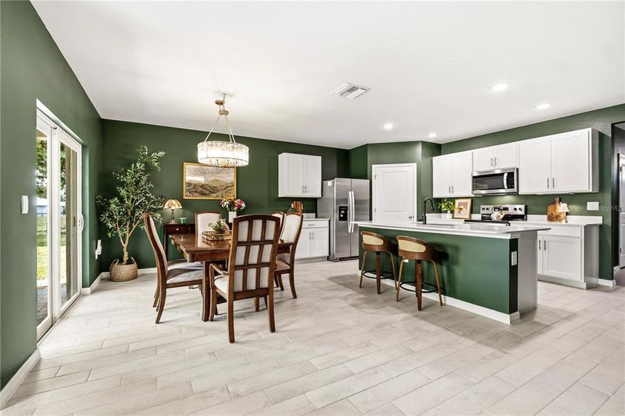 Furnished interior view inside a new home in Burnt Store Village, Punta Gorda (Image 6).