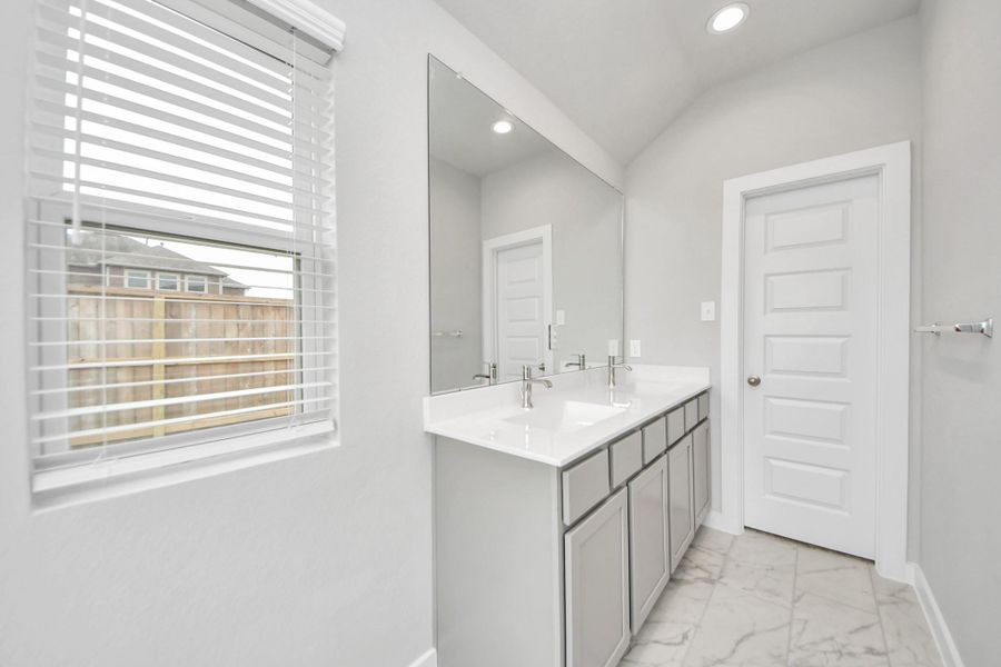 Indulge in a spa-like retreat within the confines of this primary bathroom. Sample photo of completed home with similar floor plan. Actual colors and selections may vary. Indulge in a spa-like retreat within the confines of this primary bathroom. Sample photo of completed home with similar floor plan. Actual colors and selections may vary.