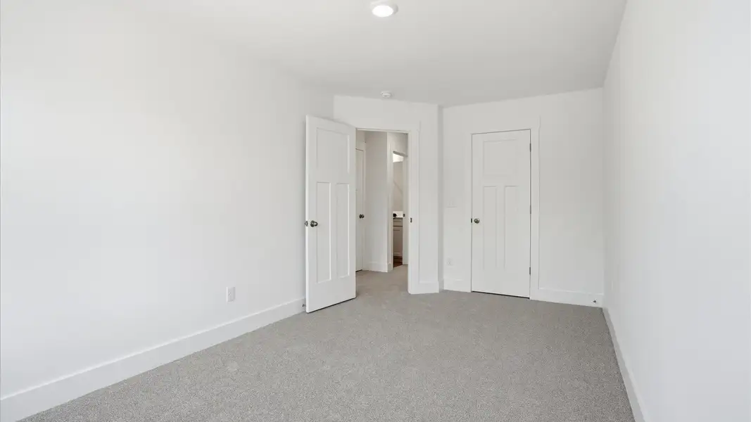 Vibrant and restful bedroom with a walk-in closet, refined detail, and a warm, welcoming atmosphere located at Marion Square