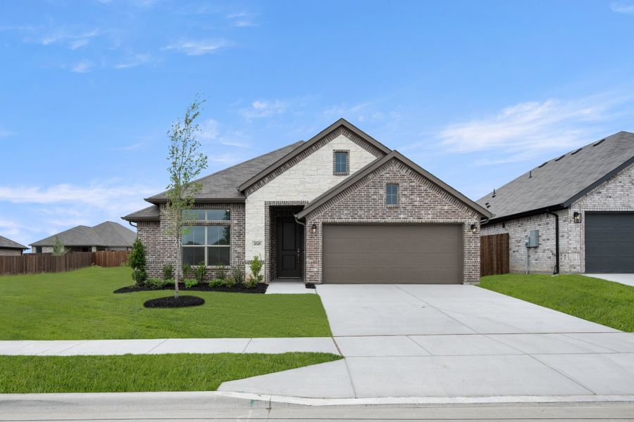 Front exterior of a new home in Summer Crest, Fort Worth, TX, highlighting curb appeal (Image 1). Front exterior of a new home in Summer Crest, Fort Worth, TX, highlighting curb appeal (Image 1).