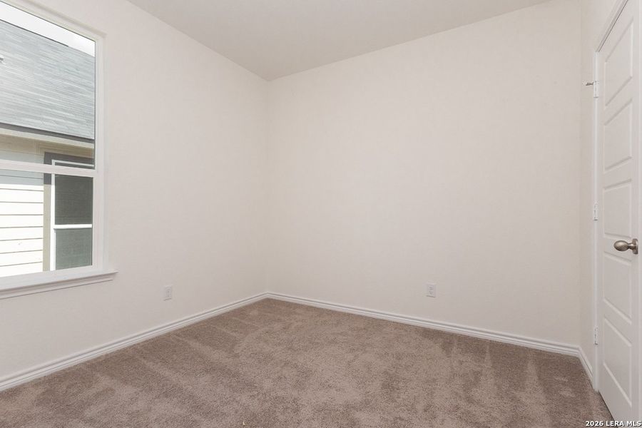 Spacious, unfurnished interior of a new home in Hidden Bluffs at TRP, San Antonio (Image 11).