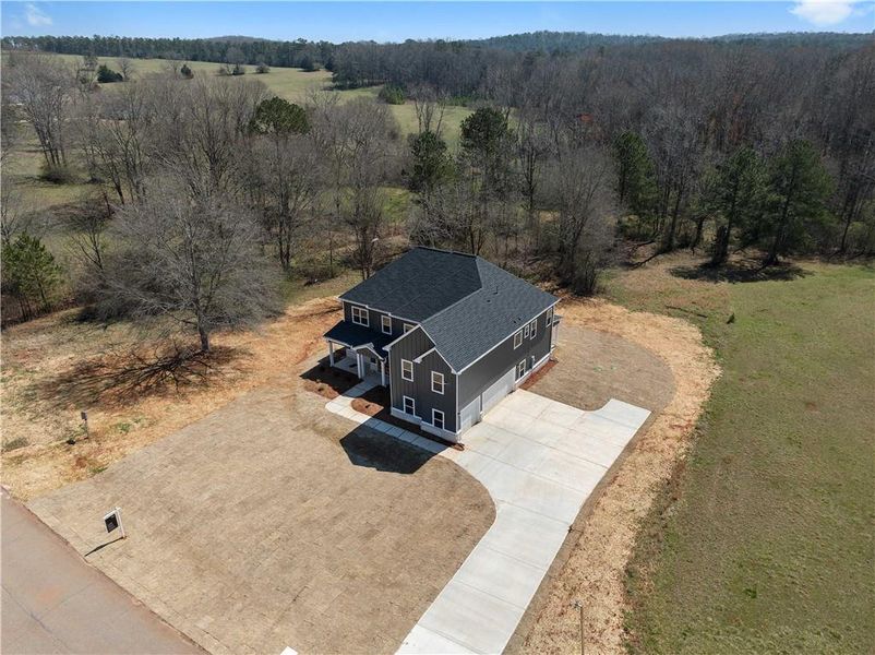Front exterior of a new home in , Social Circle, GA, highlighting curb appeal (Image 27).
