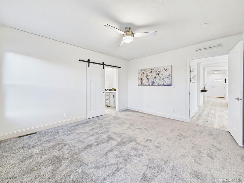 Unstaged layout highlighting walk-in closet entry and access to private bath. Unstaged layout highlighting walk-in closet entry and access to private bath.