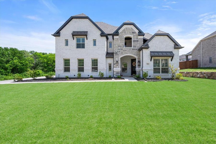 Front exterior of a new home in , Sunnyvale, TX, highlighting curb appeal (Image 21). Front exterior of a new home in , Sunnyvale, TX, highlighting curb appeal (Image 21).