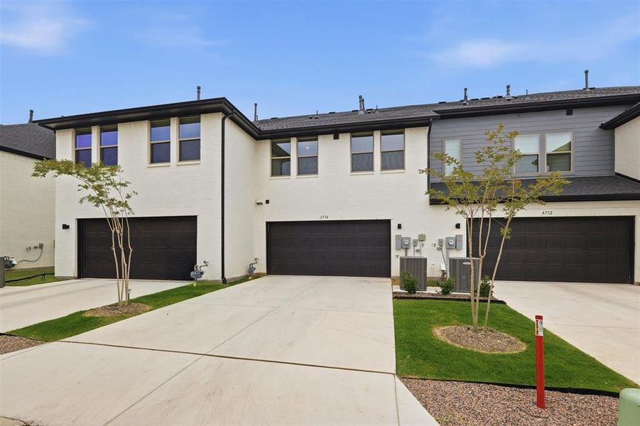 Front exterior of a new home in , Arlington, TX, highlighting curb appeal (Image 21).