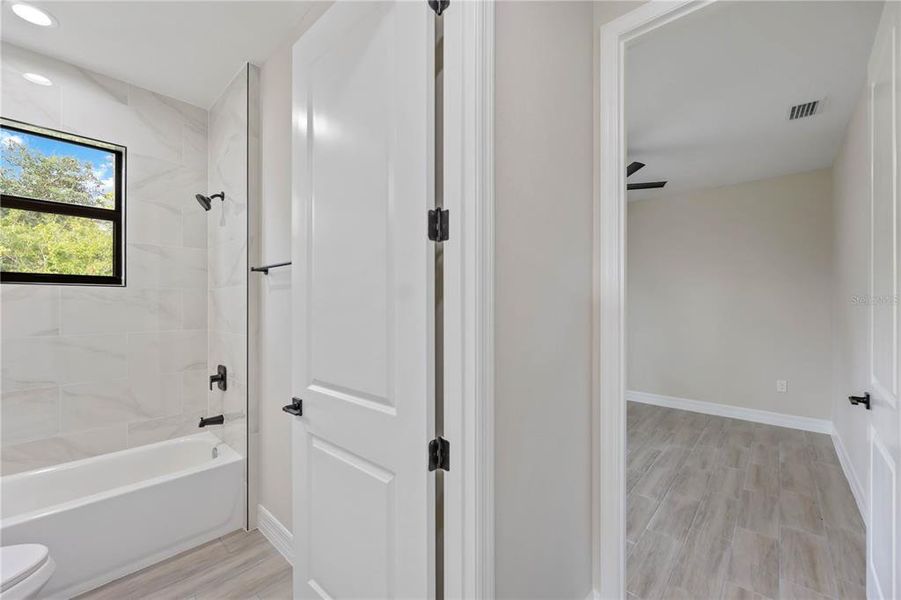 Spacious, unfurnished interior of a new home in , Port Charlotte (Image 27).