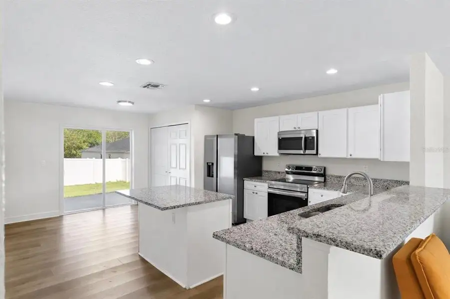 Furnished interior view inside a new home in , Auburndale (Image 11).