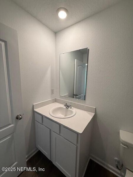 Furnished interior view inside a new home in Grand Reserve, Bunnell (Image 9).