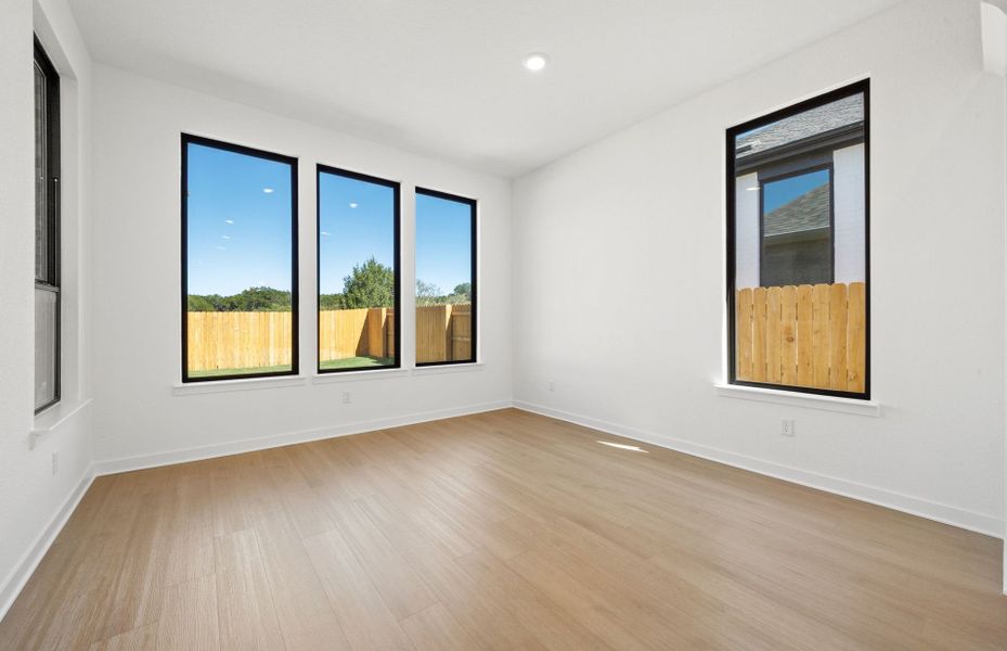 Spacious, unfurnished interior of a new home in 6 Creeks, Kyle (Image 47).
