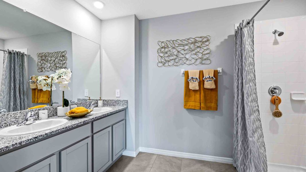 Representative furnished interior of a home built from the Robie II by D.R. Horton in Star Farms at Lakewood Ranch, Bradenton (Image 15).