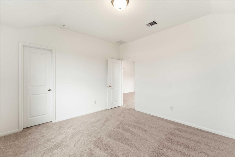 Spacious, unfurnished interior of a new home in Sunterra, Katy (Image 31).