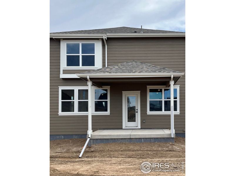 Front exterior of a new home in Bloom, Fort Collins, CO, highlighting curb appeal (Image 2).