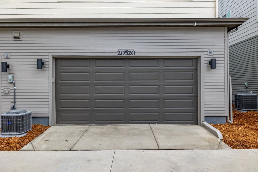 Front exterior of a new home in Painted Prairie, Aurora, CO, highlighting curb appeal (Image 25).