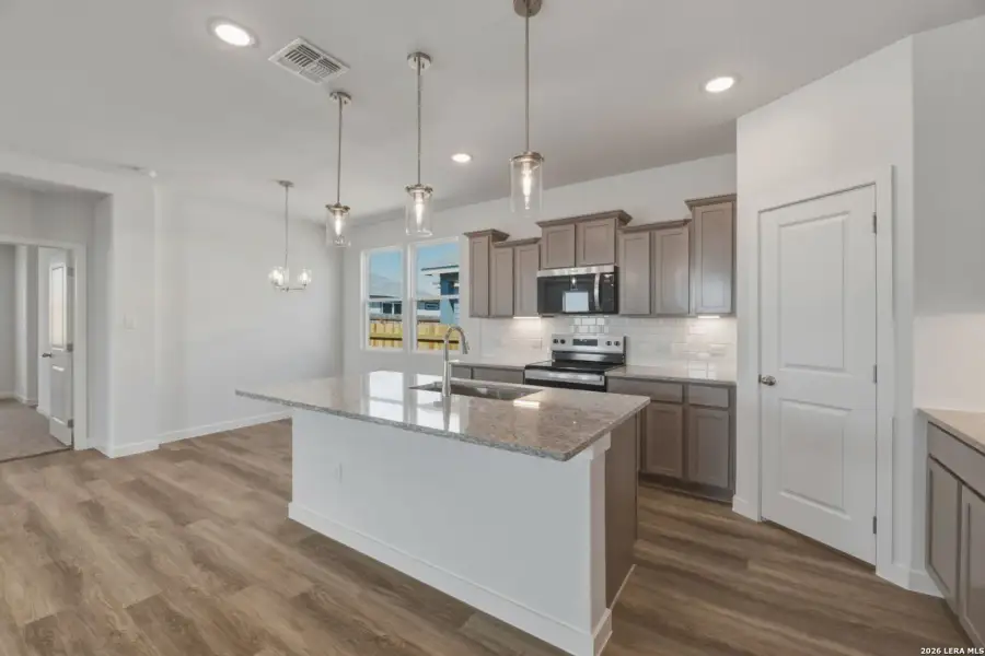 Furnished interior view inside a new home in , San Antonio (Image 3).