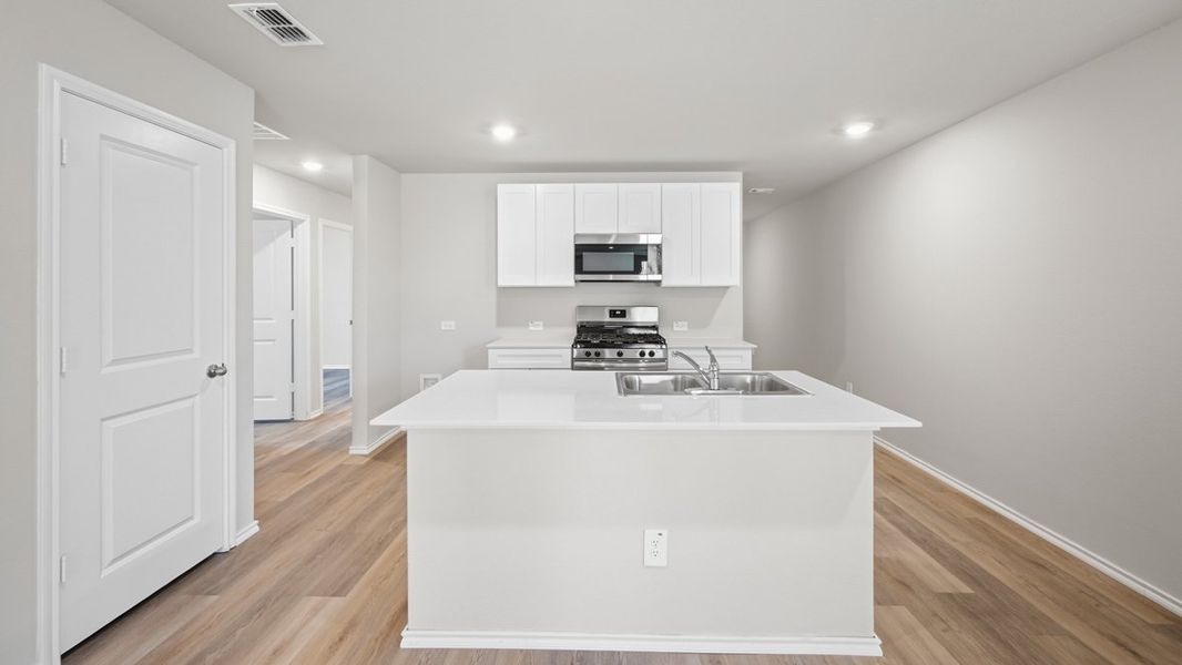 Representative furnished interior of a home built from the Estero by D.R. Horton in Hickory Grove, Krum (Image 7).