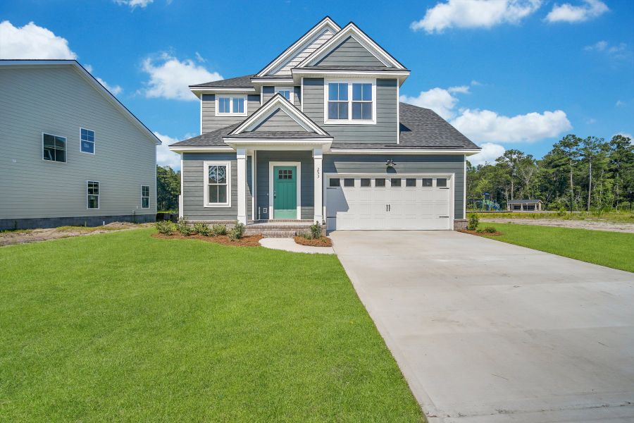 Representative exterior photo of a completed home built from the Sherwood by Ernest Homes in Wexford, Richmond Hill, GA (Image 27).