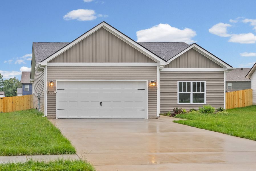 Front exterior of a new home in Cherry Fields, Clarksville, TN, highlighting curb appeal (Image 2). Front exterior of a new home in Cherry Fields, Clarksville, TN, highlighting curb appeal (Image 2).