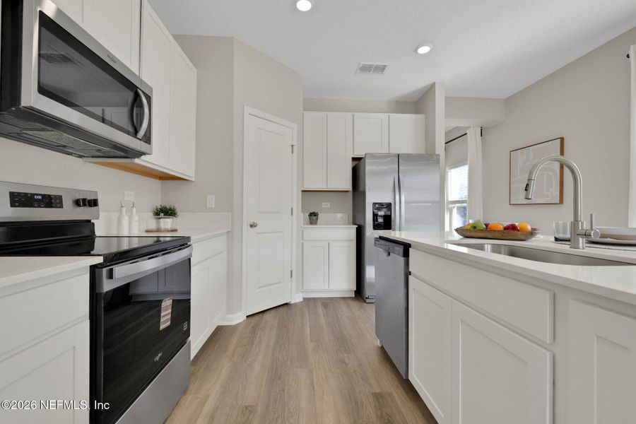 Furnished interior view inside a new home in , Jacksonville (Image 31).