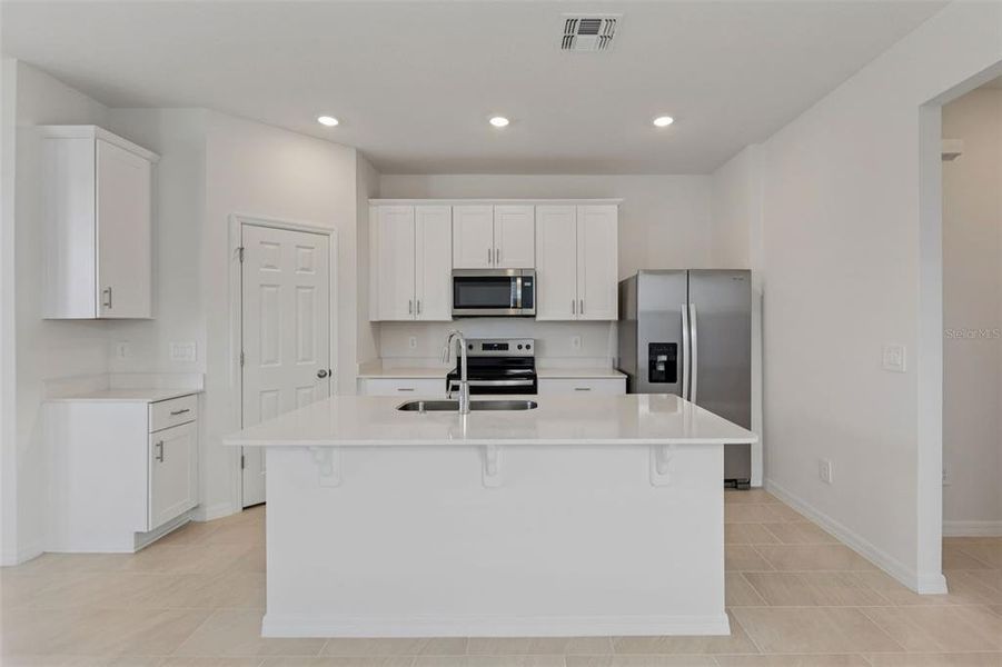 Furnished interior view inside a new home in The Meadow at Crossprairie Bungalows, St. Cloud (Image 5).