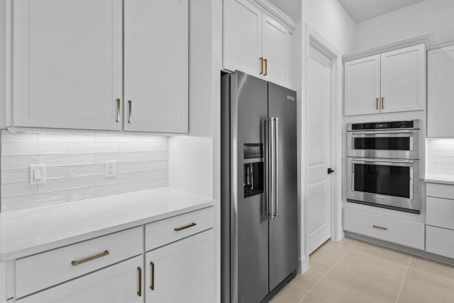 Furnished interior view inside a new home in Avondale at Avenir, Palm Beach Gardens (Image 12).