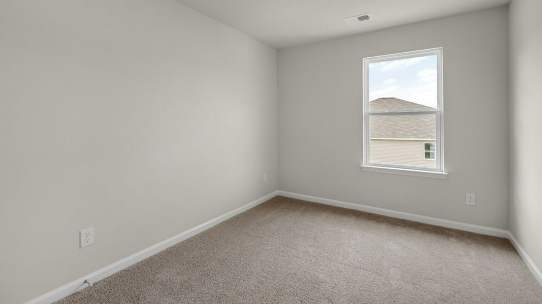 Representative unfurnished interior of a home built from the PEARSON TOWNHOME by D.R. Horton in Grayson Park Townhomes, Leland (Image 24).