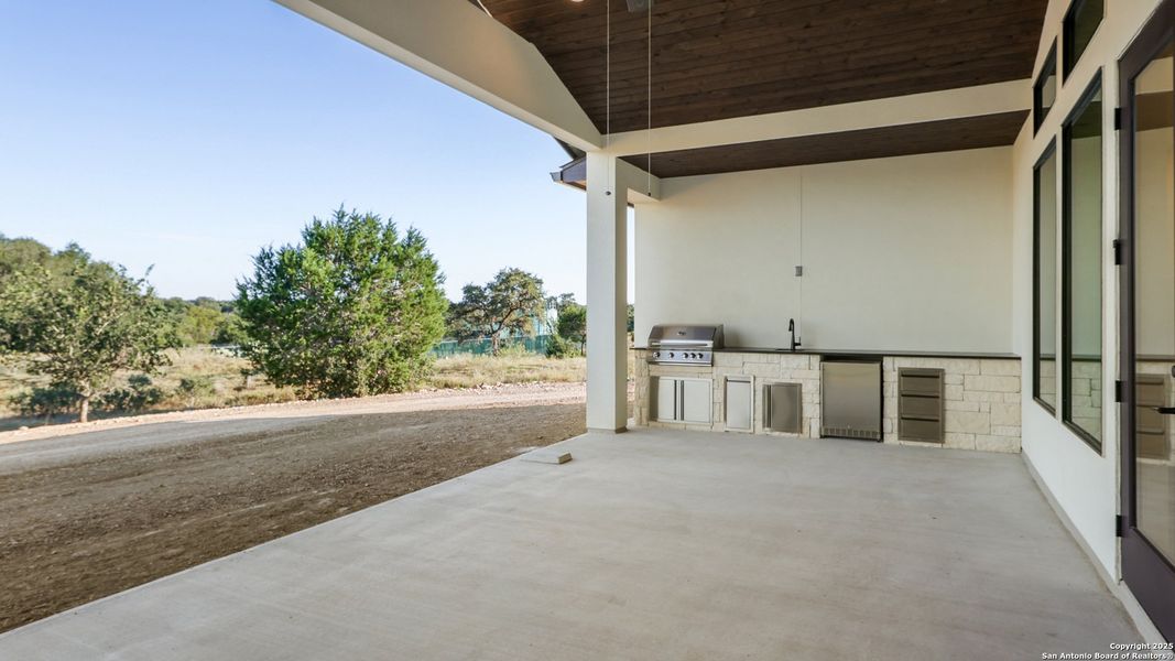 Exterior details and patio area of a home in , New Braunfels (Image 2).