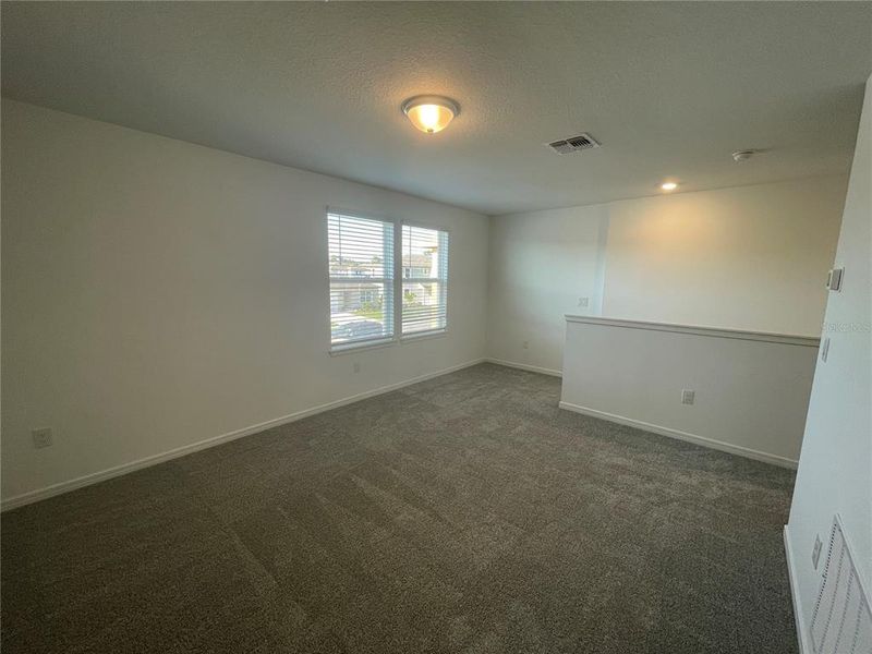 Spacious, unfurnished interior of a new home in Isles at BayView, Parrish (Image 17).