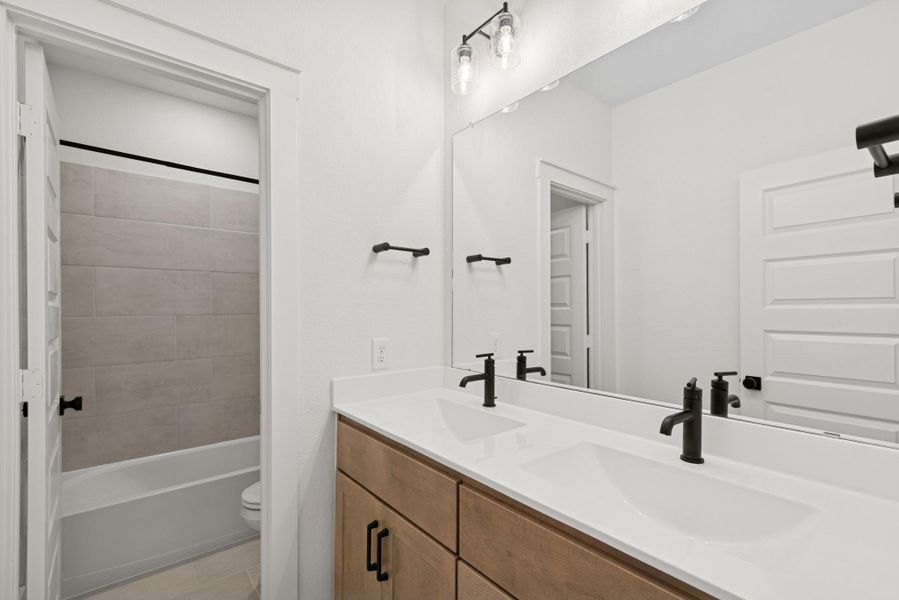 Furnished interior view inside a new home in ARTAVIA 50' Homesites, Conroe (Image 9).