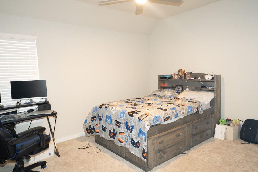 Furnished interior view inside a new home in Sunterra, Katy (Image 10).