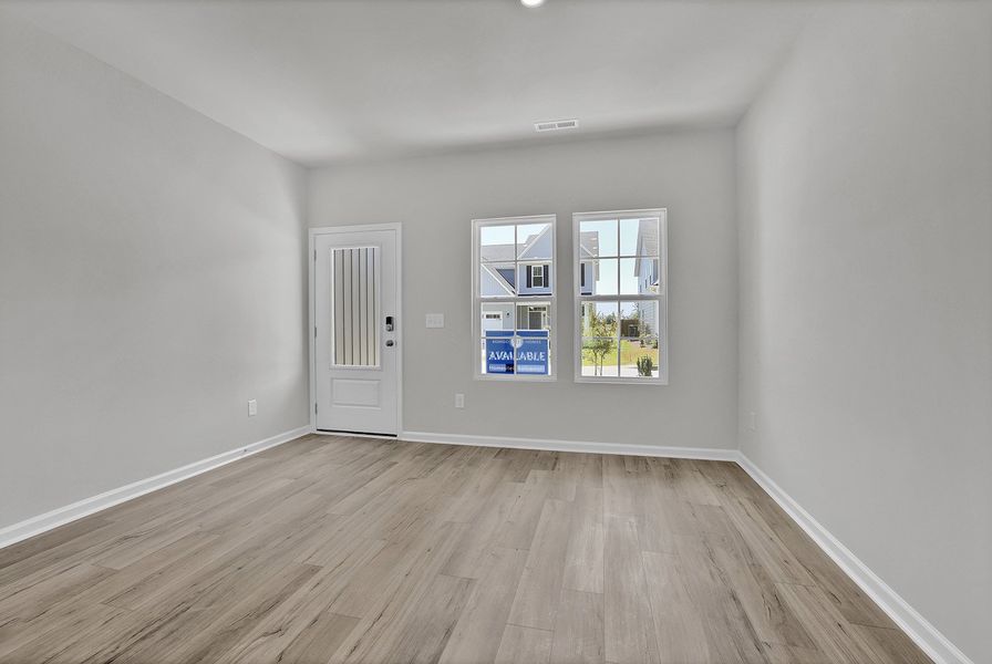 Spacious, unfurnished interior of a new home in River Tide Farms, Bolivia (Image 10).