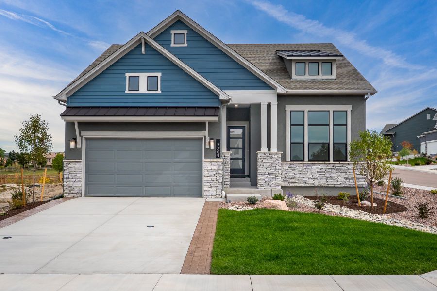 Front exterior of a new home in Cloverleaf – Mountainview Collection, Monument, CO, highlighting curb appeal (Image 1). Front exterior of a new home in Cloverleaf – Mountainview Collection, Monument, CO, highlighting curb appeal (Image 1).
