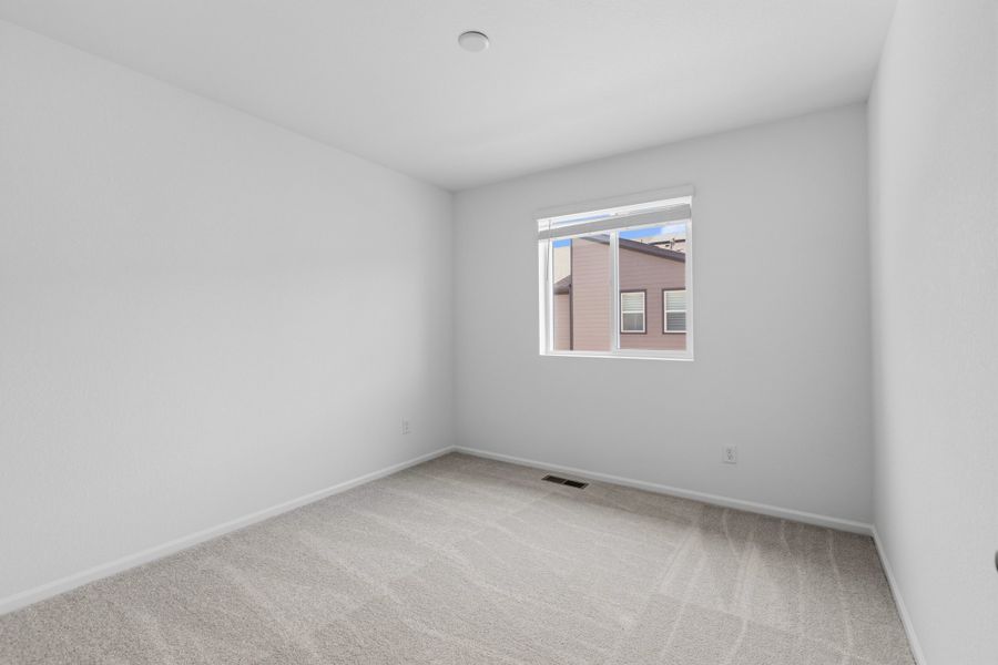 Spacious, unfurnished interior of a new home in Woodrose at Painted Prairie, Aurora (Image 18).