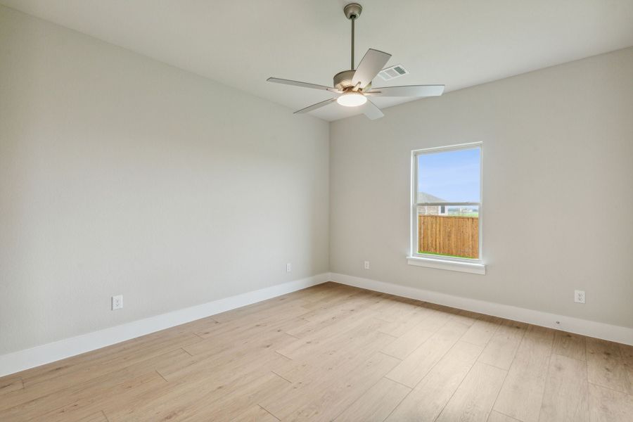 Representative unfurnished interior of a home built from the Casita by Centre Living Homes in Ellis Ranch Estates, Waxahachie (Image 9).