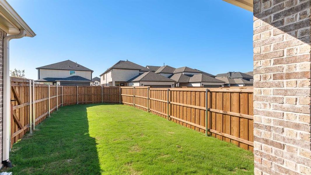 Exterior details and patio area of a home in The Parks At Wilson Creek 40', Celina (Image 1).