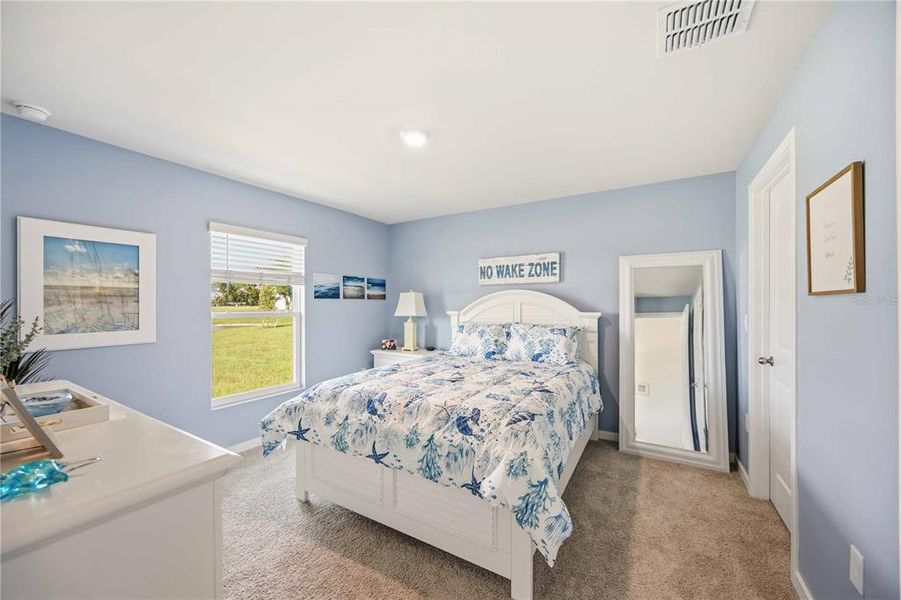 Furnished interior view inside a new home in Central Parc, North Port (Image 6).