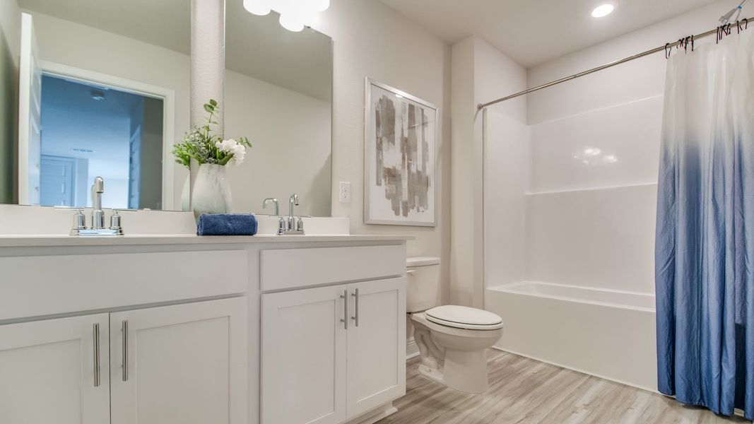 Furnished interior view inside a new home in Magnolia at the Bluffs Phase 3, Freeport (Image 25).