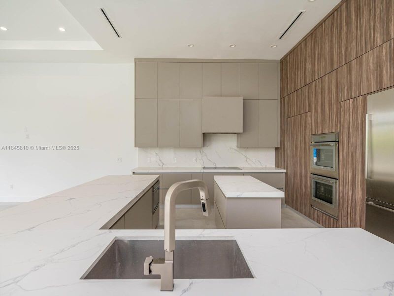 Furnished interior view inside a new home in , Miami (Image 34).