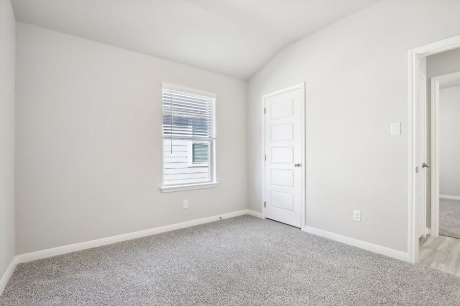 Guest bedroom in the Oleander floorplan at a Meritage Homes community. Guest bedroom in the Oleander floorplan at a Meritage Homes community.